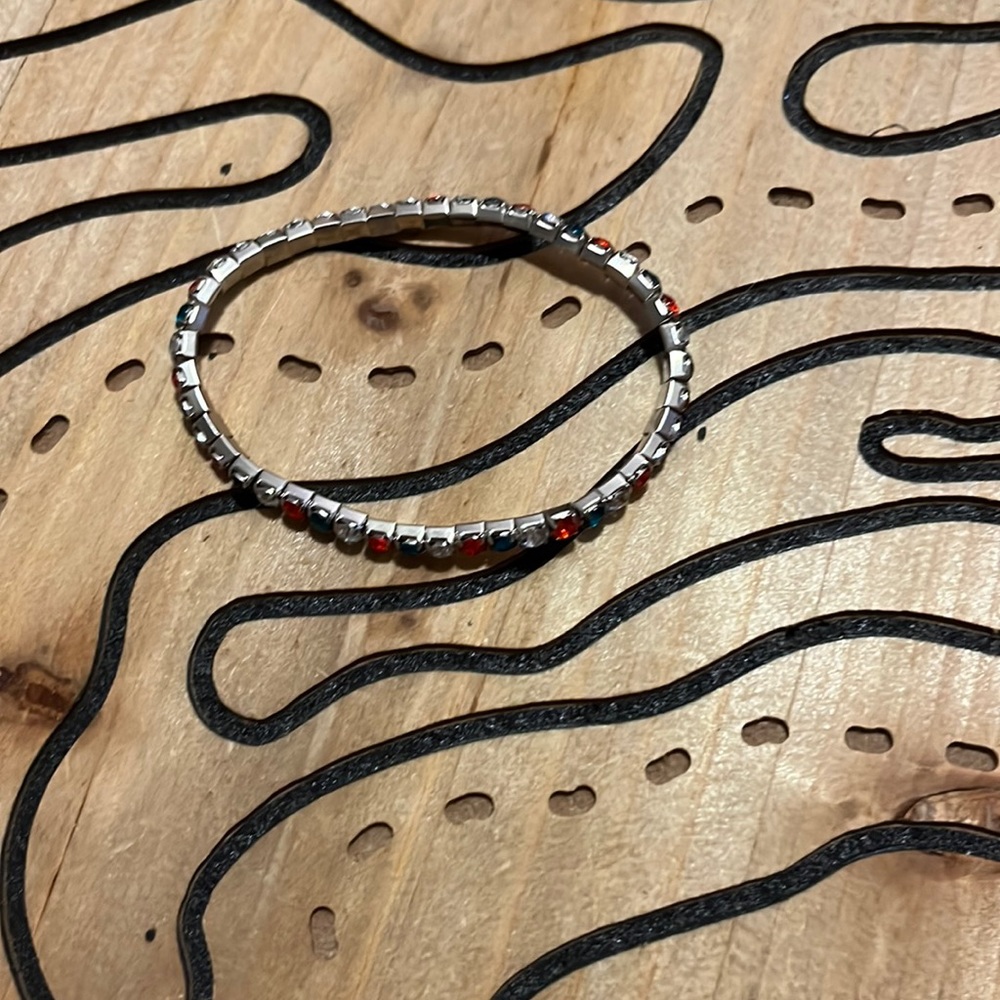 This bracelet is white, green and red